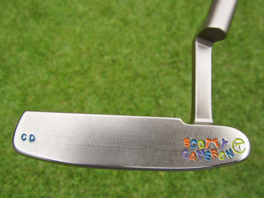 scotty cameron tour only pro platinum 009 prototype circle t putter with peace sign and smiley face stamps golf club