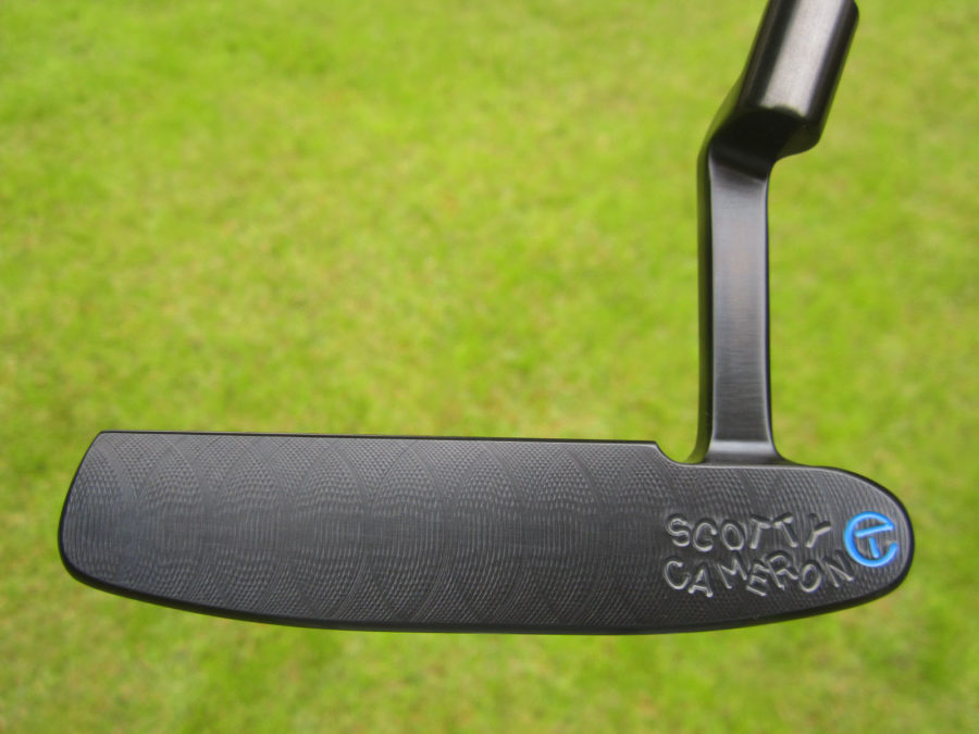 scotty cameron tour only brushed black carbon 009 prototype circle t putter with peace sign and smiley face stamps golf club