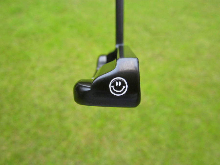 scotty cameron tour only brushed black carbon 009 prototype circle t putter with peace sign and smiley face stamps golf club