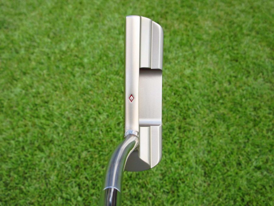 scotty cameron tour only two tone polished sss and chromatic bronze toolbox studio design prototype circle t putter with welded 1.5 round neck and peace surfer stamp golf club