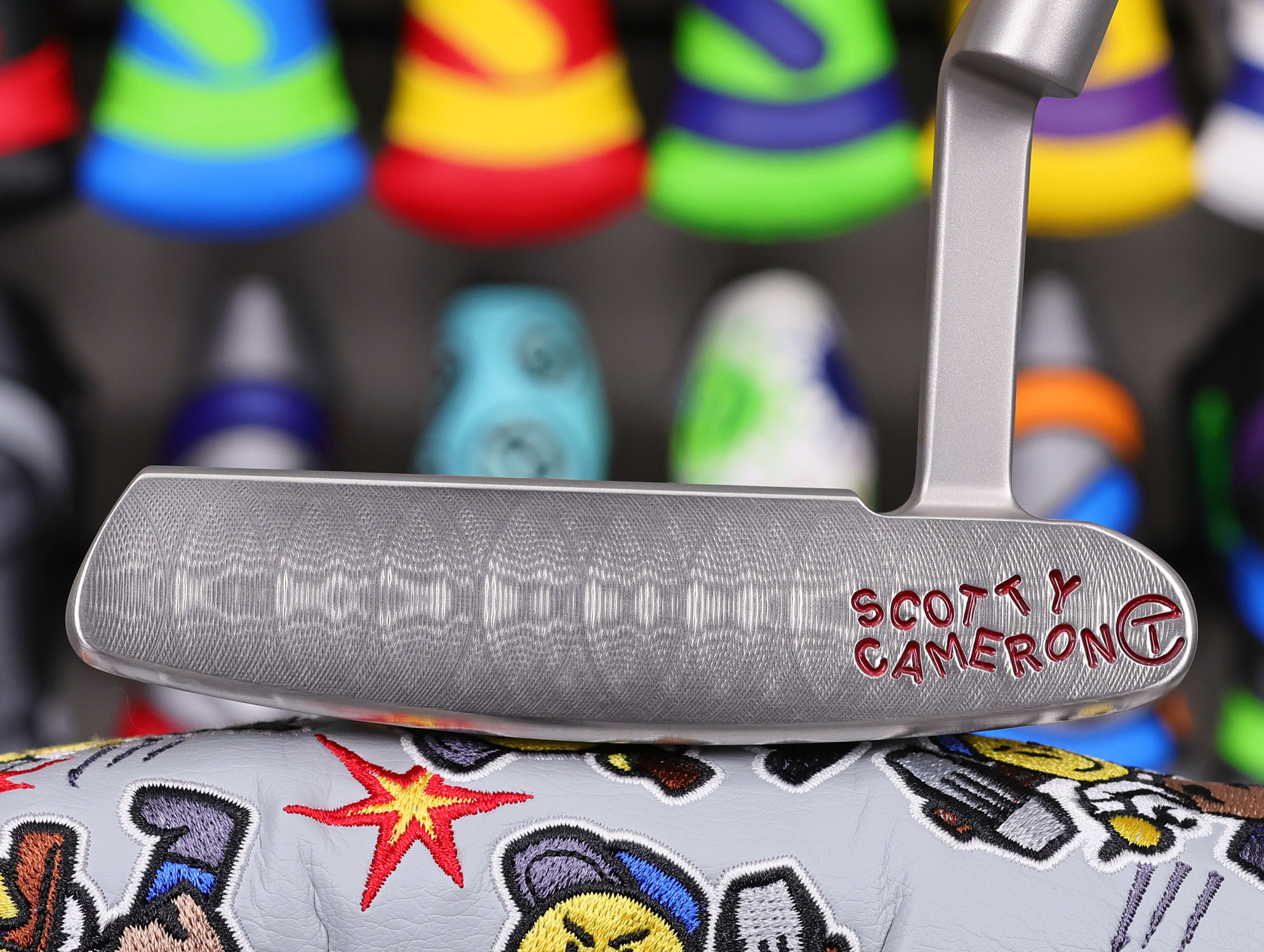 scotty cameron tour only sss newport beach handstamped circle t 330g putter with sound slot and translucent red paint fill golf club